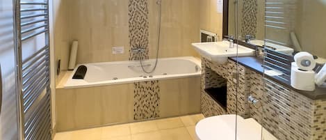Double or Twin Room | Bathroom | Combined shower/tub, jetted tub, free toiletries, hair dryer
