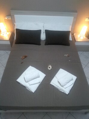 Standard Quadruple Room | Premium bedding, minibar, desk, free WiFi