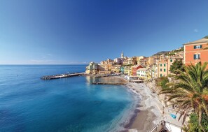A coastal town with colorful buildings, a pier, and a beach. - Stunning apartment in Genova (GE) (Genova (GE))