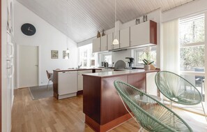 Fridge, stovetop, dishwasher, coffee/tea maker