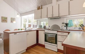 Fridge, stovetop, dishwasher, coffee/tea maker