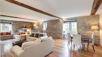 Comfort Cottage, 3 Bedrooms | Living area | TV, fireplace