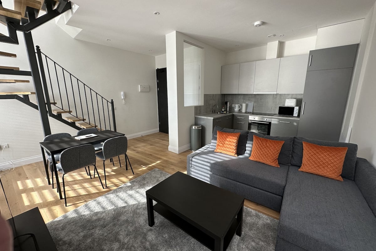 comfort apartment, 1 double bed | living area | flat-screen tv