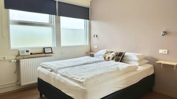 Habitación doble, baño privado | Wifi gratis y ropa de cama