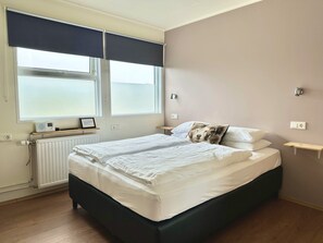 Habitación doble, baño privado | Wifi gratis y ropa de cama