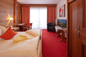 Desk, blackout curtains, free WiFi, bed sheets