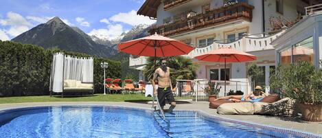 Indoor pool, seasonal outdoor pool, pool umbrellas, pool loungers