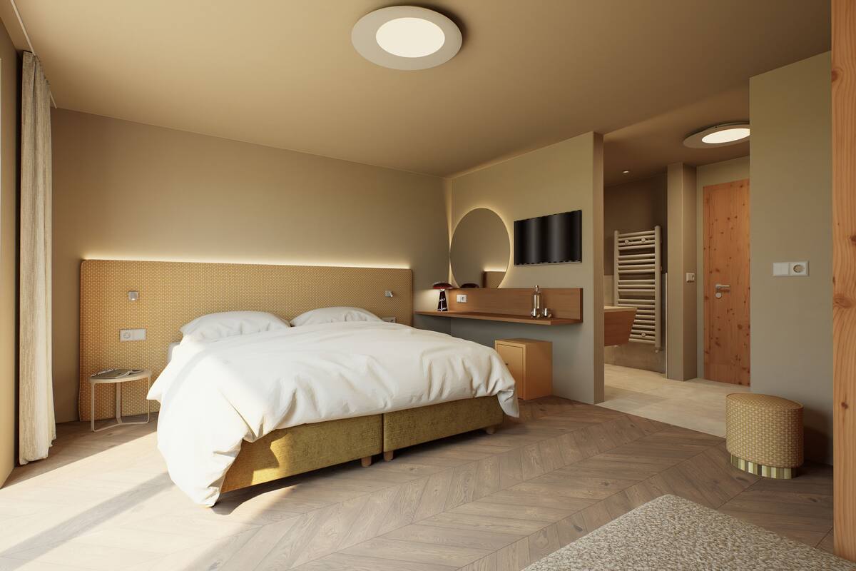 Ropa de cama hipoalergénica y caja de seguridad en la habitación 