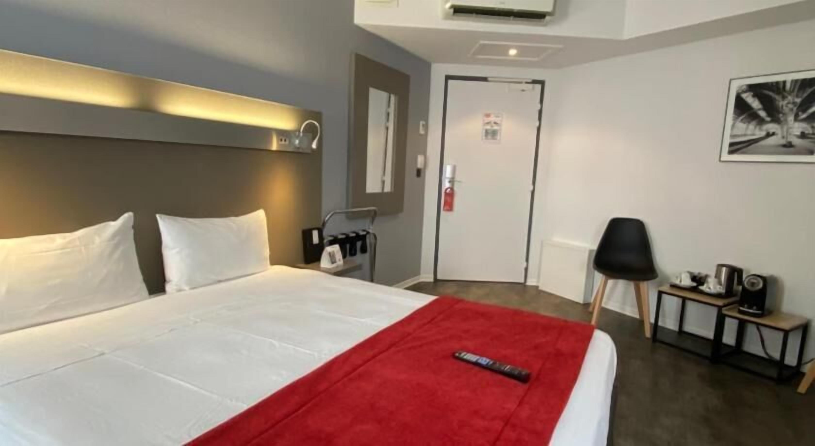 Premium bedding, down duvets, Select Comfort beds, in-room safe