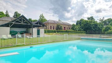 Outdoor pool, pool umbrellas, pool loungers