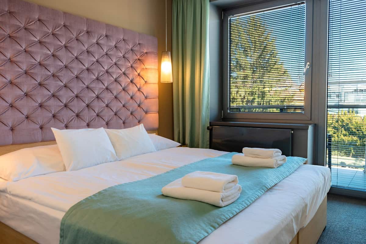 Deluxe vierpersoonskamer | 1 slaapkamer, luxe beddengoed, individueel gedecoreerd