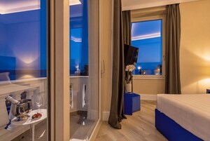 Doppia Deluxe, balcone, vista mare | Biancheria da letto di alta qualità, copriletto in piuma