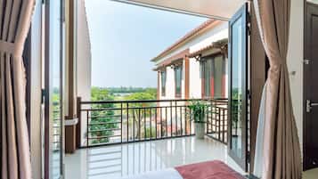 Deluxe Triple Room, Balcony, Garden View | View from room