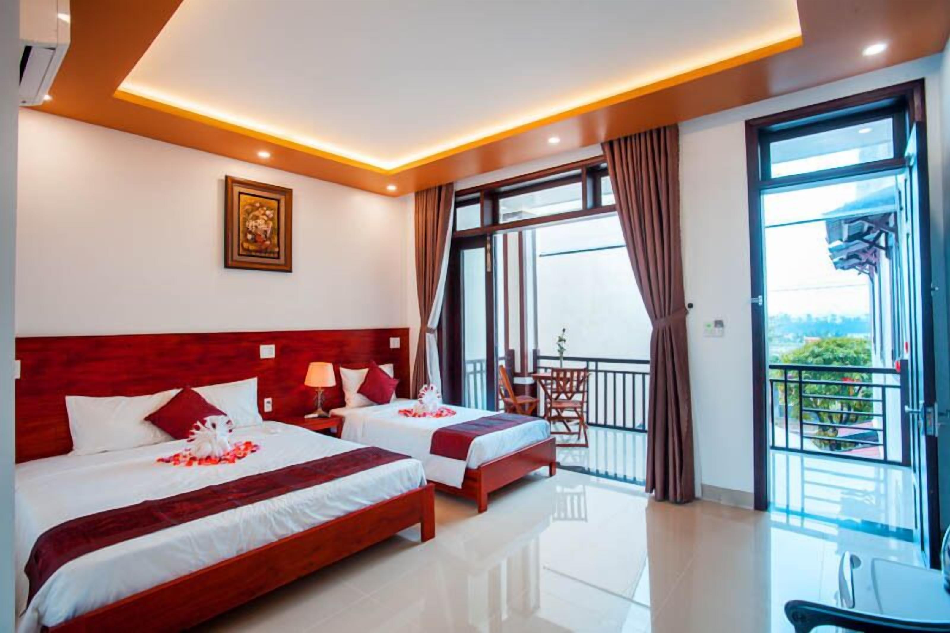 Deluxe Triple Room, Balcony, Garden View | Premium bedding, minibar, individually decorated, individually furnished
