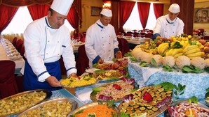 A buffet setup with various food items and chefs serving. - Hotel Club Costa Elisabeth (Ciro)