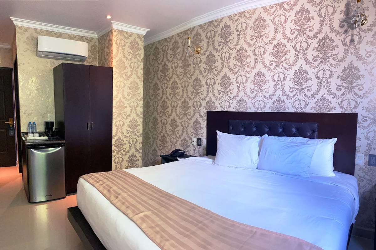 1 slaapkamer, luxe beddengoed, donzen dekbedden, een minibar