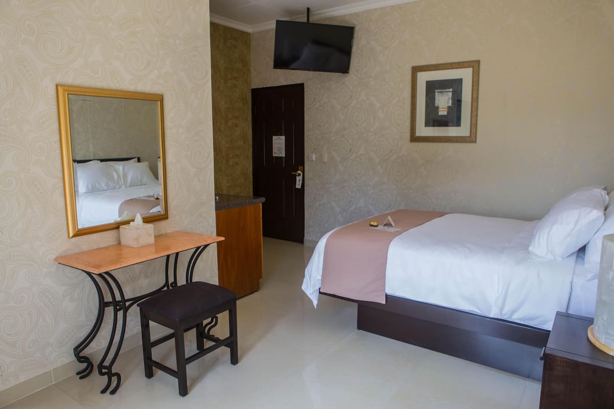 1 slaapkamer, luxe beddengoed, donzen dekbedden, een minibar