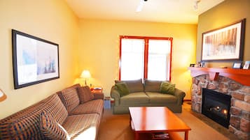 Exclusive Condo, 2 Bedrooms, Mountain View, Slope side | Living area | Flat-screen TV, fireplace