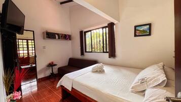 Habitacion Doble | Blackout curtains, iron/ironing board, free WiFi, bed sheets