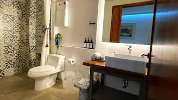 Superior Studio Suite | Bathroom | Hair dryer, towels, soap, shampoo