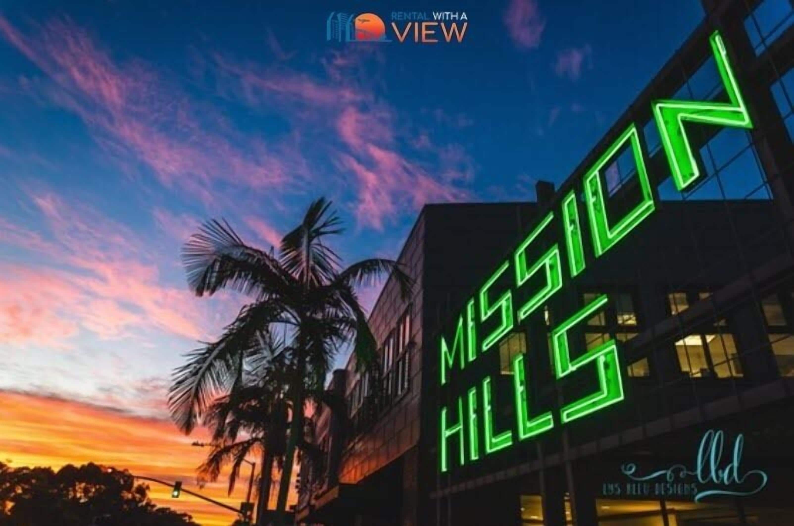 A building with a neon sign reading "MISSION HILLS" against a twilight sky.