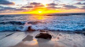 A beach with waves and a sunset. Text indicates "7 different beaches nearby". - ♥ Best Value in SD! $1M Views; Great Location; Award Winner ♥ (San Diego)