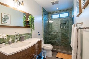 Regadera, tina de hidromasaje, secadora de cabello, bidet 