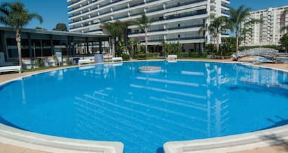 Condo with swimming pools, HEATED Swiming pool / FREE wifi / BBQ. - only families