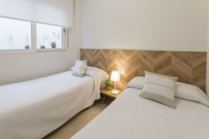 2 slaapkamers, een strijkplank/strijkijzer, gratis wifi, beddengoed