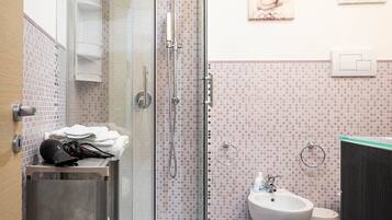 Hair dryer, bidet, towels, soap