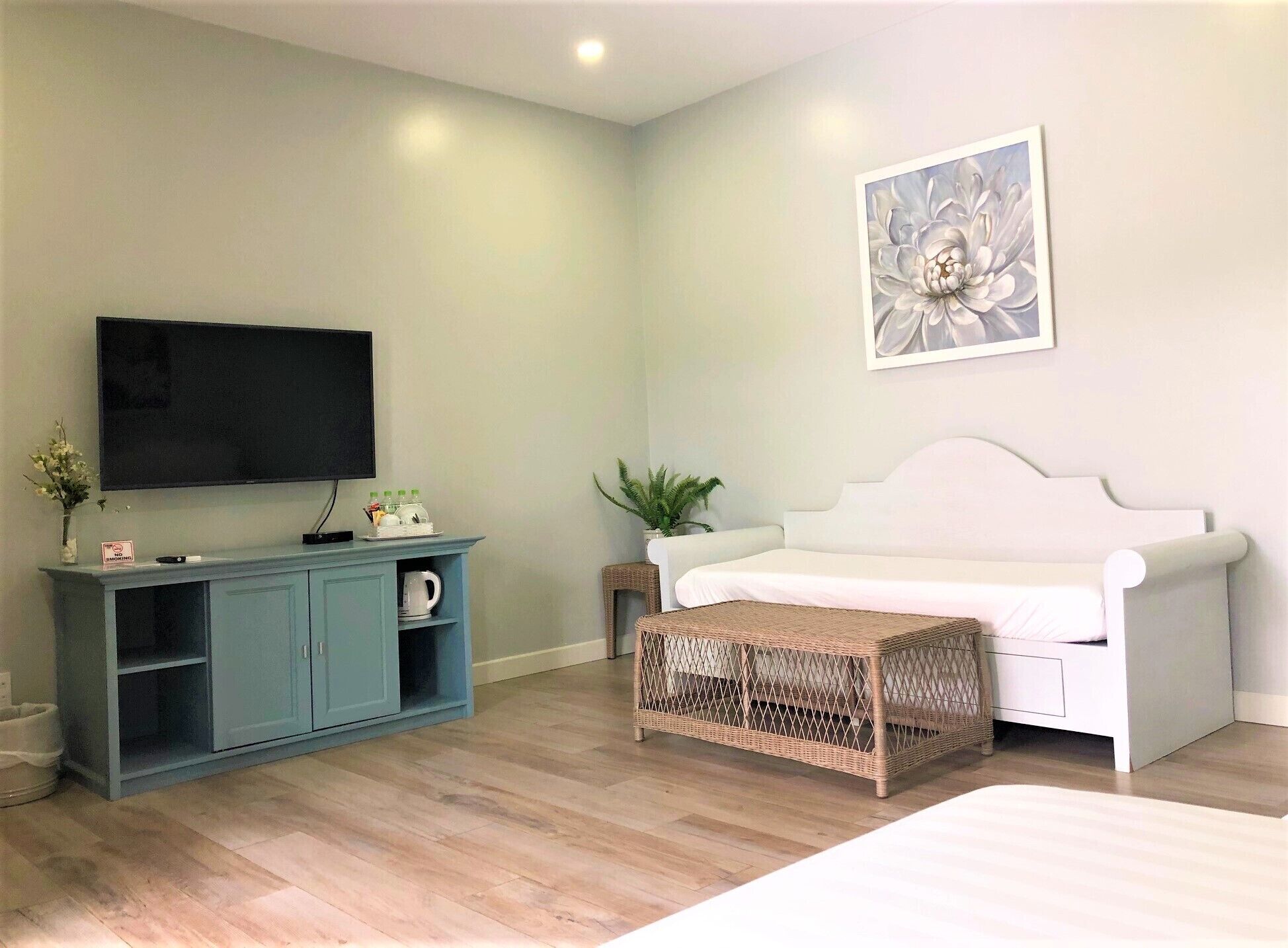 courtyard family room | minibar, in-room safe, desk, blackout curtains