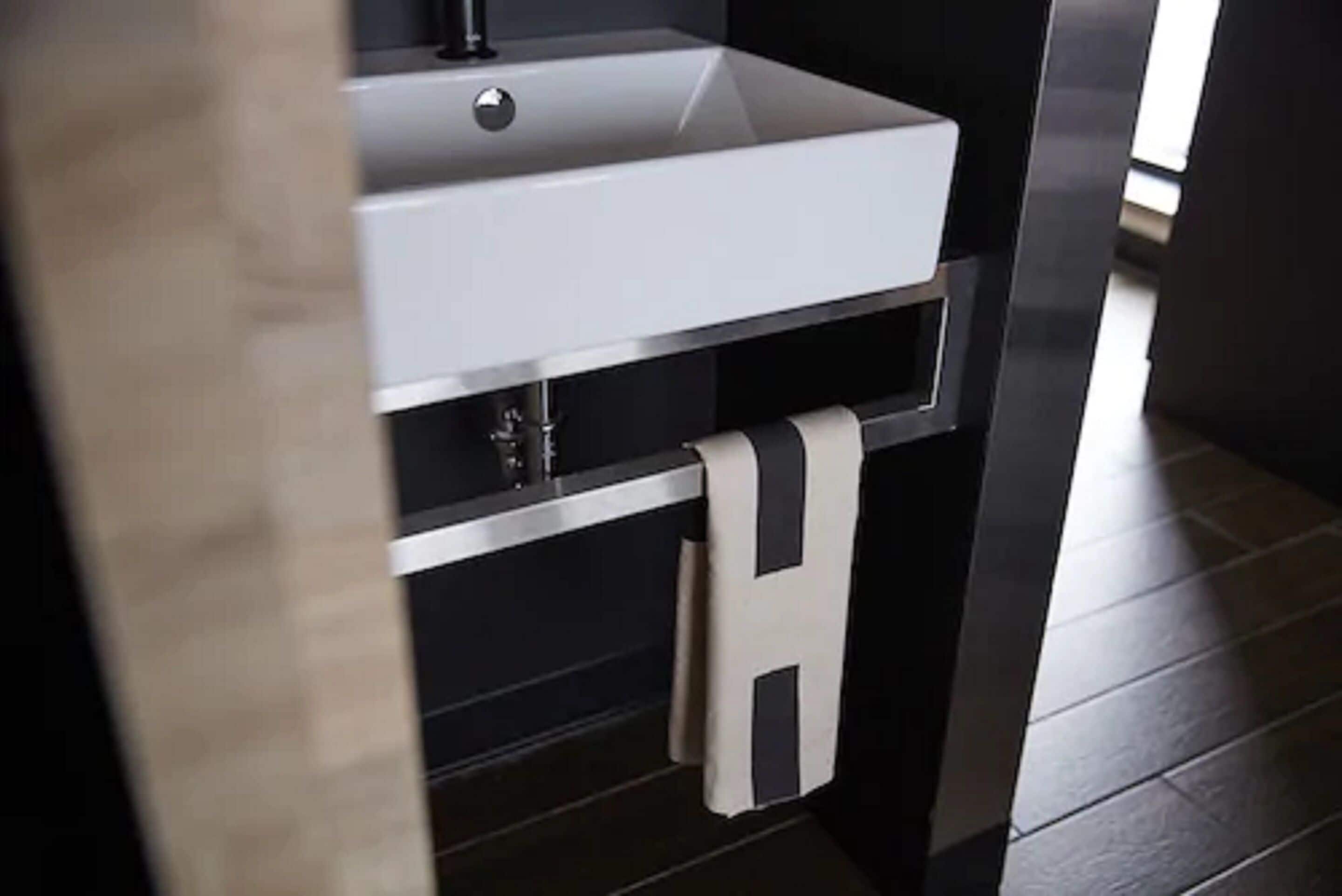 studio plus - 1 king bed | bathroom sink