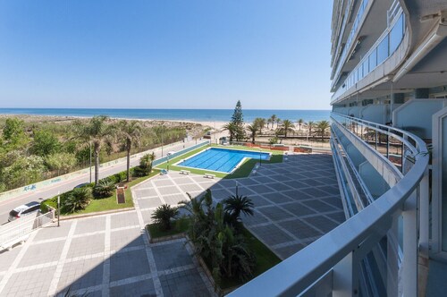 Ocean view condo located steps from the beach. Modern decoration! ONLY FAMILIES
