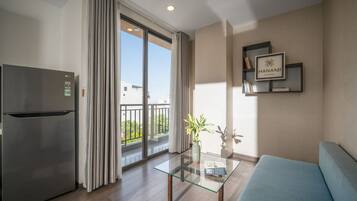 Apartamento, 1 quarto | Frigobar, cofres nos quartos, escrivaninha, quartos à prova de som