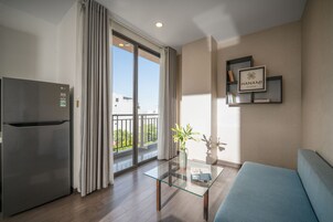 Apartment, 1 Bedroom | Minibar, in-room safe, desk, soundproofing