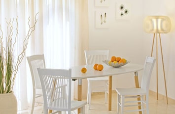Large extendable dining table which seats 12 people