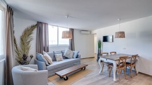 Deluxe Apartment 1, 2 Bedrooms, Ocean View, Sea Facing | Living room | 32-inch LED TV with satellite channels, Smart TV - Mijas Residence (Mijas)