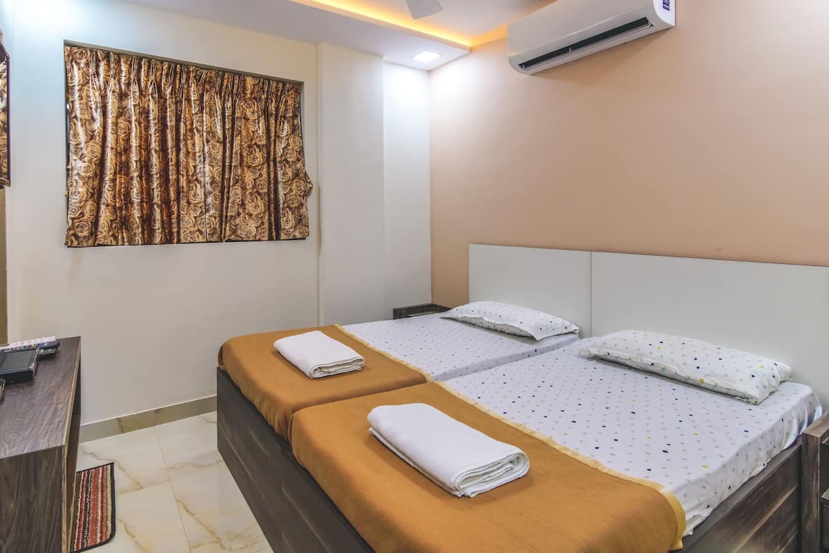 Pillow-top beds, in-room safe, desk, free WiFi