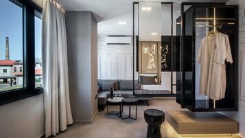 Deluxe Suite, 1 King Bed with Sofa bed, City View | Living area | 43-inch Smart TV with satellite channels