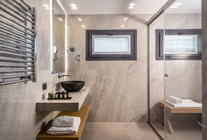 Deluxe Suite, 1 King Bed with Sofa bed, Partial Sea View | Bathroom | Shower, rainfall showerhead, designer toiletries, hair dryer