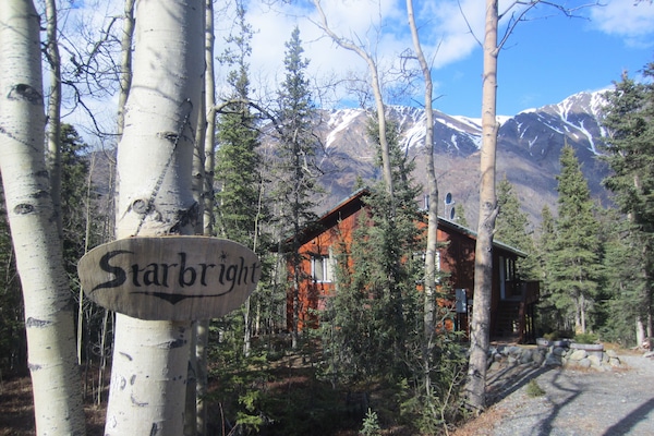 This home is situated in mature spruce and birch forest in a quiet neighborhood.