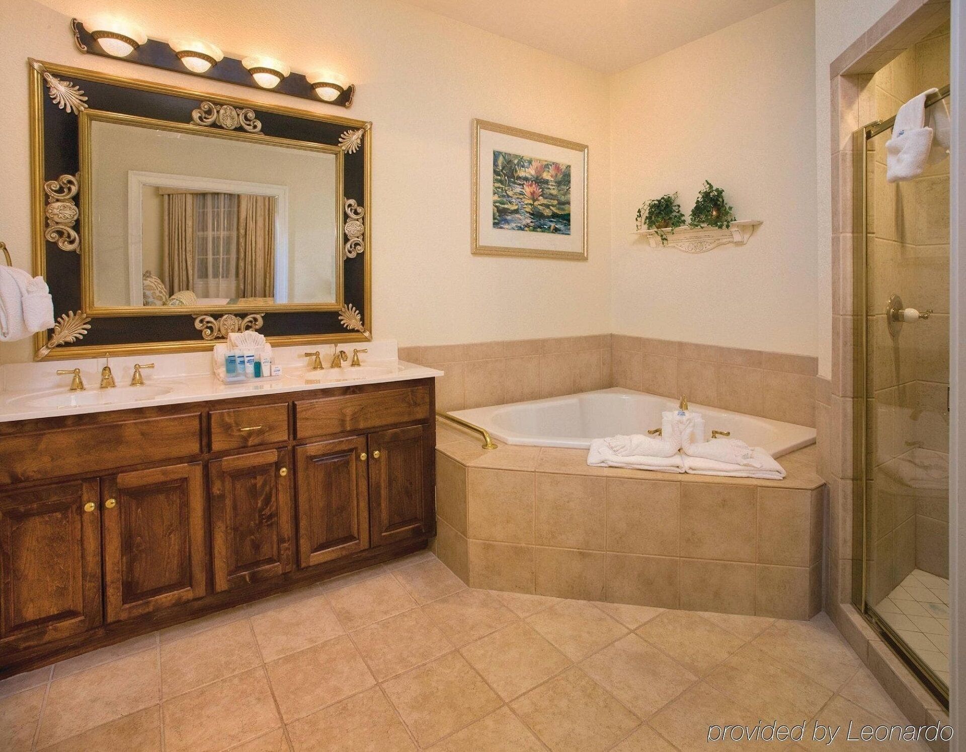 Combined shower/tub, jetted tub, eco-friendly toiletries, hair dryer