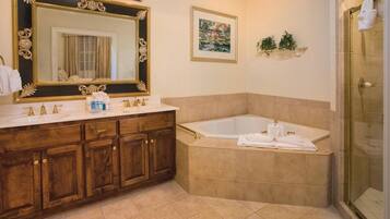 Combined shower/tub, jetted tub, eco-friendly toiletries, hair dryer