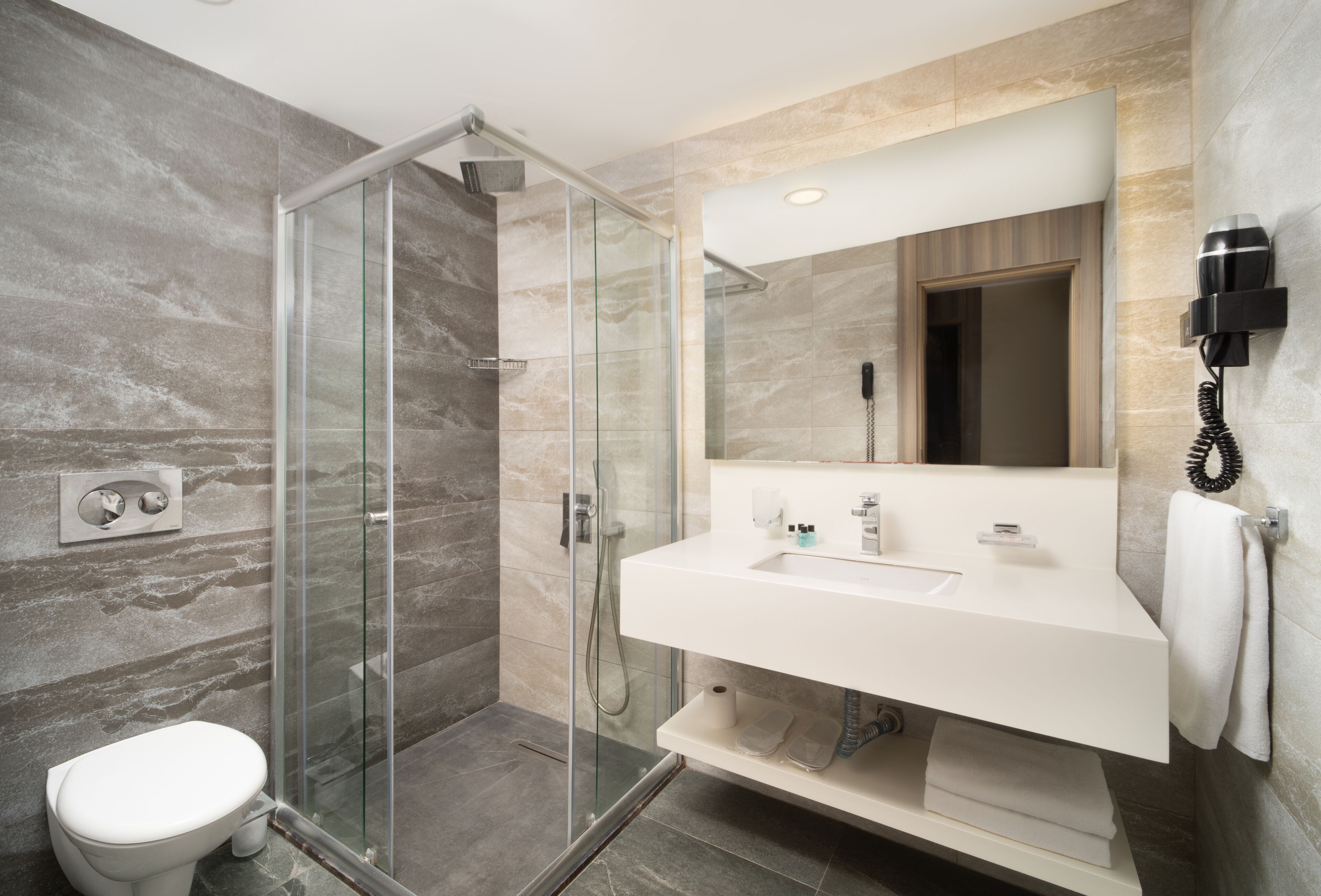 shower, free toiletries, hair dryer, slippers