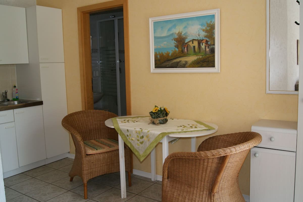 Family Apartment, 1 Bedroom | In-room dining