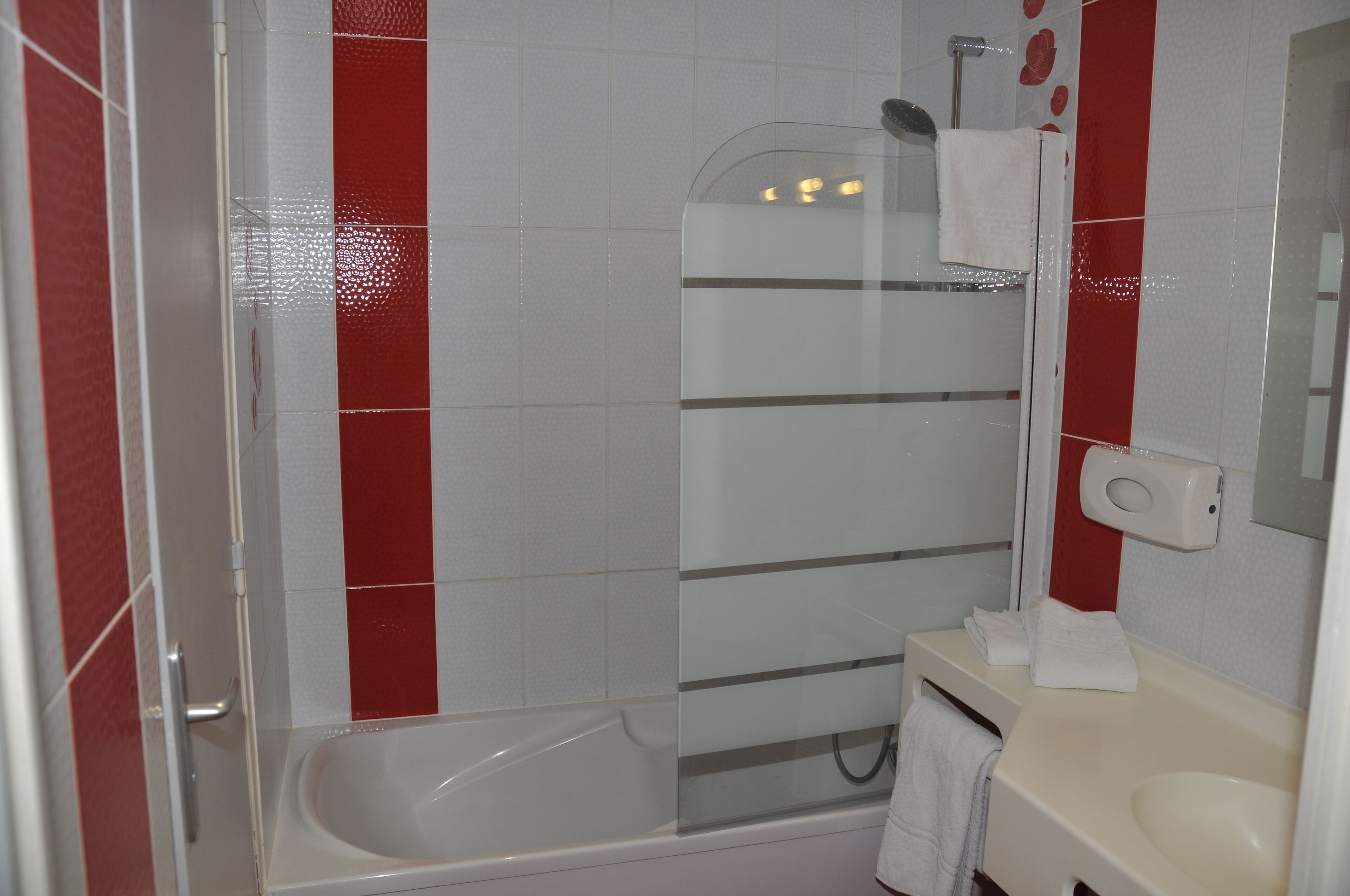 comfort triple room, multiple beds | bathroom | free toiletries, towels