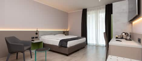 Superior Double Room, Balcony | Minibar, in-room safe, individually furnished, desk