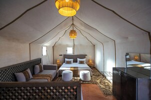 Deluxe Tent, Multiple Beds | 1 bedroom, down comforters, individually decorated