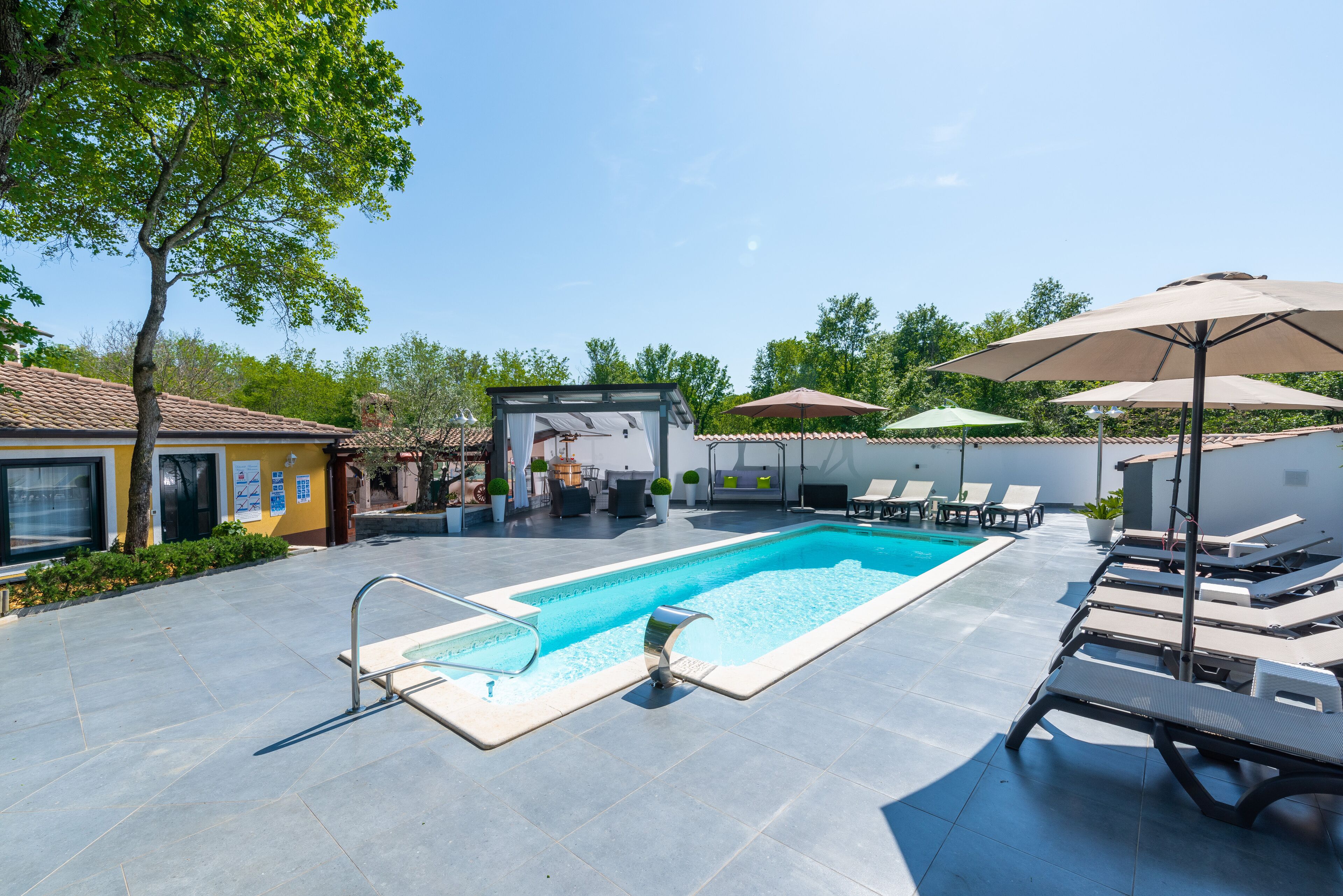 Seasonal outdoor pool, open 9 AM to 9 PM, free pool cabanas