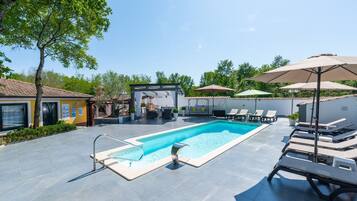 Seasonal outdoor pool, open 9 AM to 9 PM, free pool cabanas